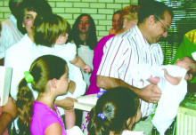 St. Patrick church baptized the child of friends of the Bristers who evacuated to East Carroll. COURTESY PHOTO