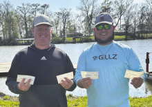 Tournament winners (from left) Jake Andrews and Mason Caldwell. LISA REDDICK