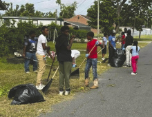 DEBRA HOPKINS Young people cleaning up around Lake Providence.