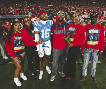 Junior with family and supporters COURTESY PHOTO
