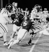 BA sophmore Jackson Thornton comes down with a big tackle in a previous matchup. SADIE PIPPIN