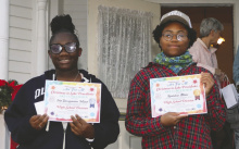 High school division winners (from left) Sha'Devviyaninia Wilson, second place, and Ragan Atlas, first place. Not pictured are Davis Holt, third place, and Jack Woodall, honorable mention.