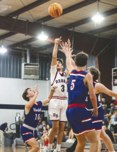 Eighth grader Jake Thornton goes for two.