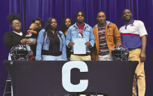 Ahmoniee Williams with family after signing a letter of intent to play football at Centenary. DEBRA HOPKINS