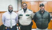Pictured (from left) are Gregory Campbell Jr. and Tystin White, with Sheriff Wydette Williams.