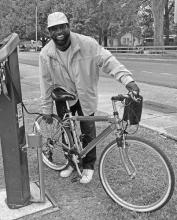 “Louisiana Legend” Larry Perkins pictured utilizing the Bike Repair Station installed by the City of St. Joseph in partnership with the LSU AgCenter Healthy Communities Program.