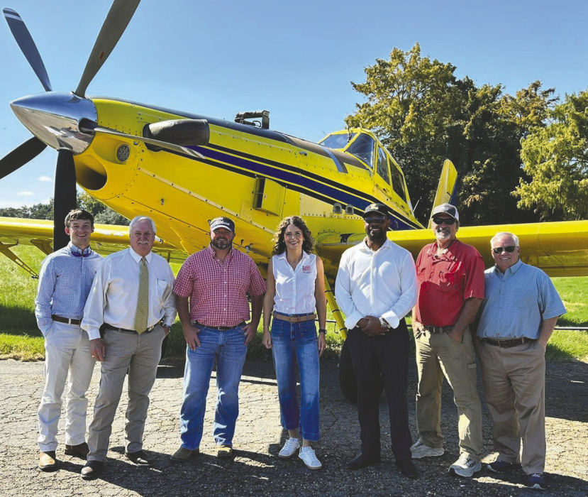 COURTESY PHOTO According to her Facebook account, U.S. Rep. Julia Letlow was in Lake Providence earlier this week. In addition to taking a ride in a crop duster, she met with some local people at Byerley House at a fundraising lunch. Joining Letlow are (from left) Jacob Brister, local attorney, Bill Hopkins, sheriff's deputy, Bradley Ferrell, ag pilot, Letlow, Wydette Williams, East Carroll sheriff, Ronald Pippin, local farmer, and Andy Brister, local attorney.