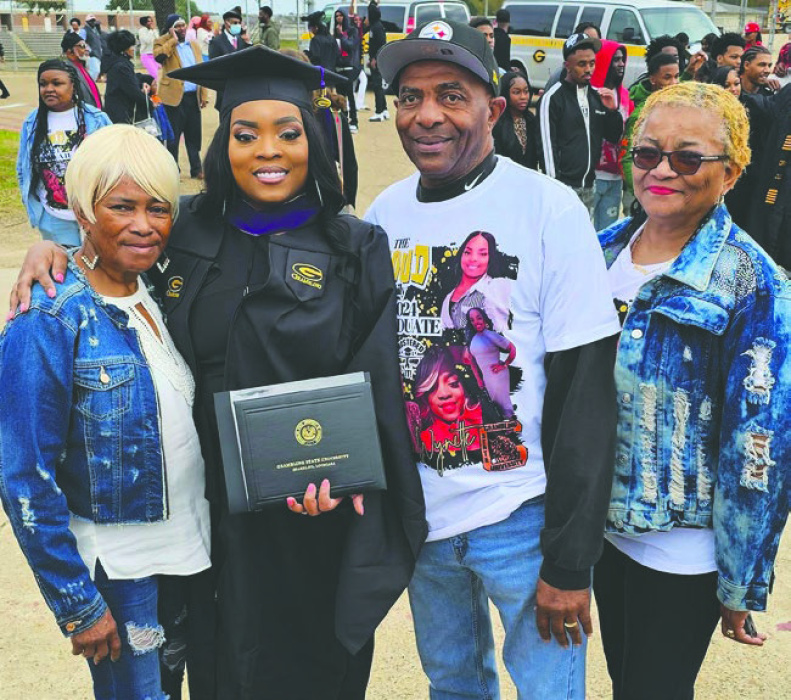 Celebrating with family are (from left) Elizabeth Brown, graduate Kiara Swift, James Wayland, and Mary Ann Brown. COURTESY PHOTO