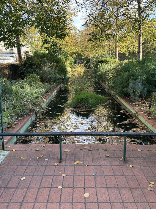 Water feature on elevated walkway in Paris