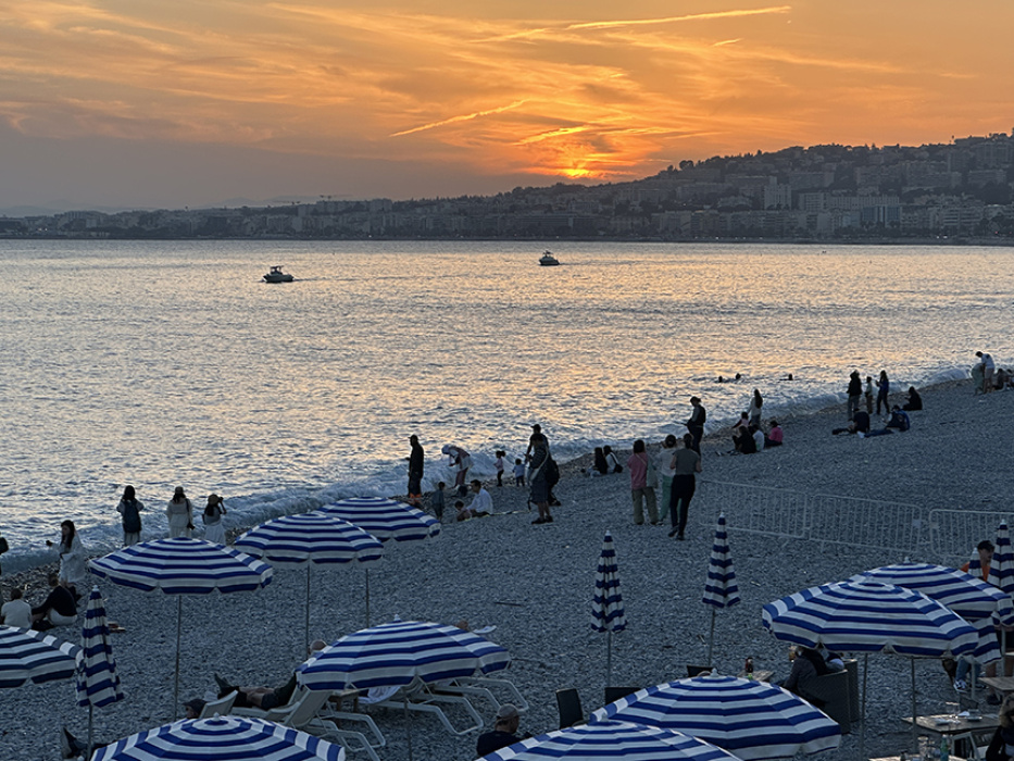 Sunset over the stone beach in Nice