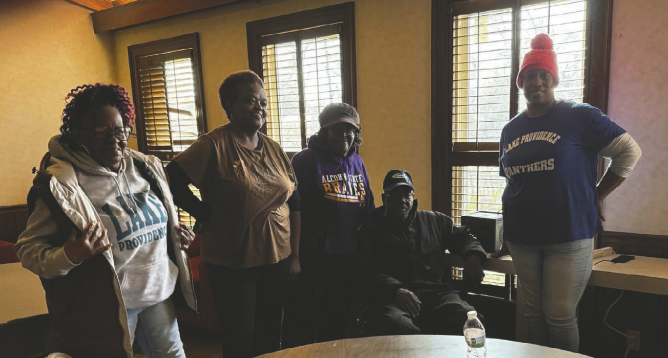 The helpers at one of Delta Interfaith’s warming centers, Grace Episcopal Church’s Harris Hall. Tarsha Matthews (far right) made homemade gumbo for 250 people that day, and served other meals in following days.