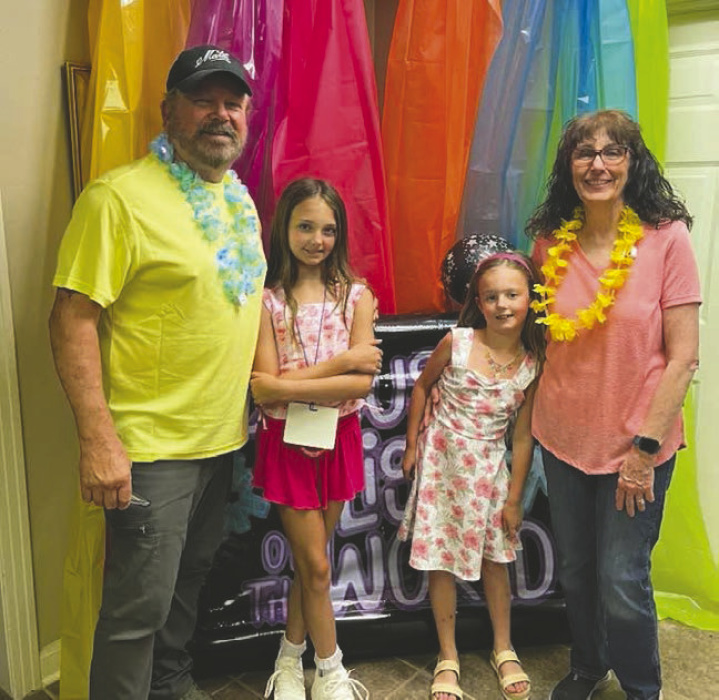 Juddie and Kathy Mills with grandchildren
