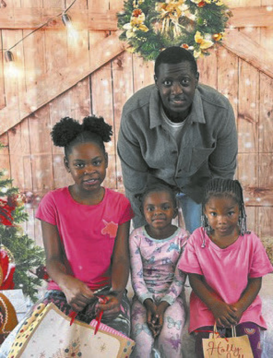 TeeJay with some gift recipients