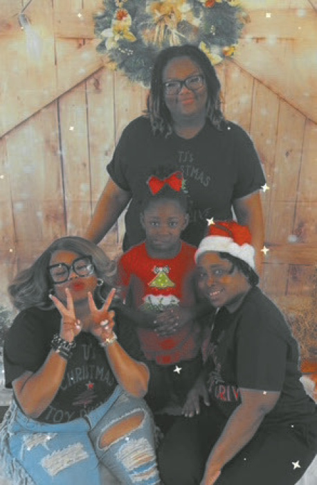Volunteers at TeeJay Rice's Christmas event included Kayla Spencer, Shamari Rice, and Tracey Reynolds.