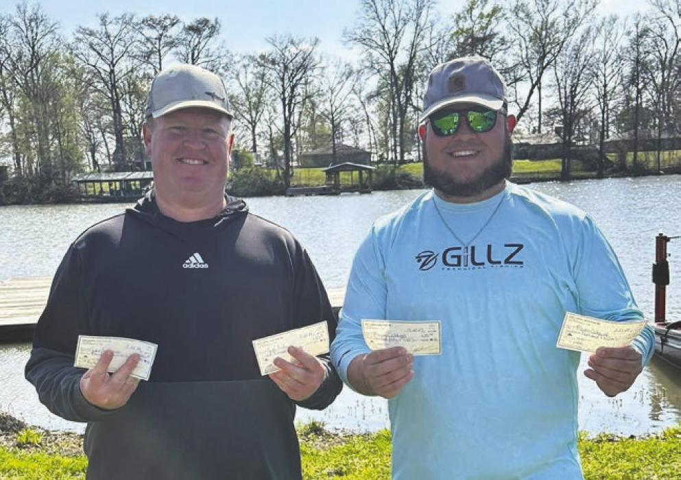 Tournament winners (from left) Jake Andrews and Mason Caldwell. LISA REDDICK