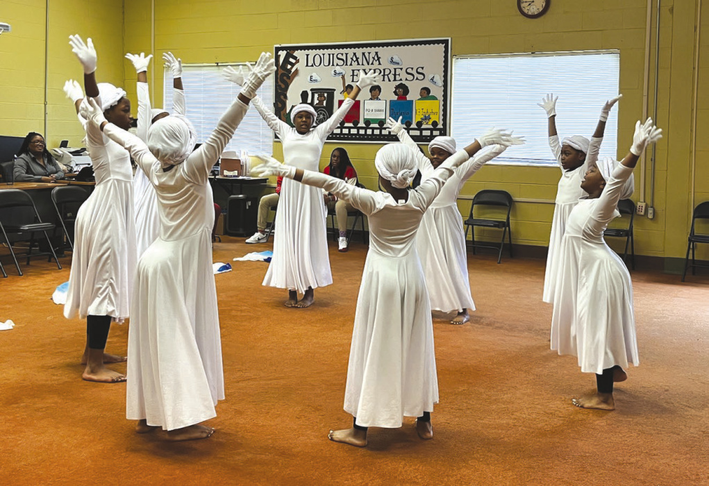 Members of Spencer Bee Girls perform at last week’s East Carroll Parish School Board meeting.