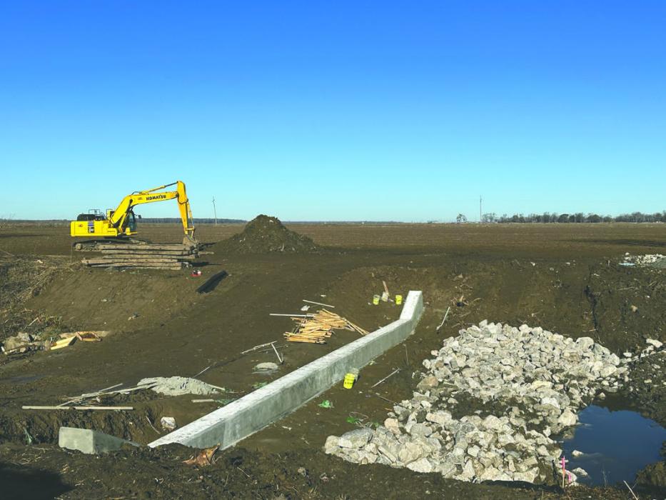 Repairs continue on the weir on Tensas Bayou.