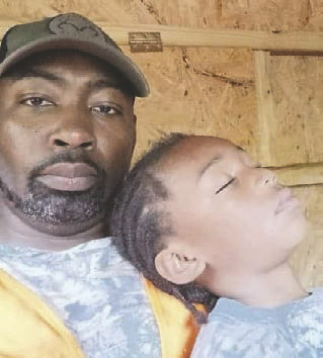 Deer hunters Alfred Young Jr. and Alfred Young III