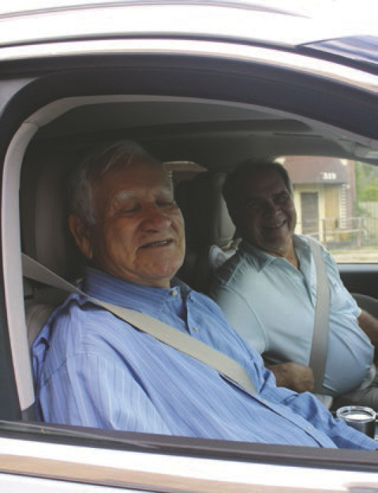 Waiting in the car for their shoppers.