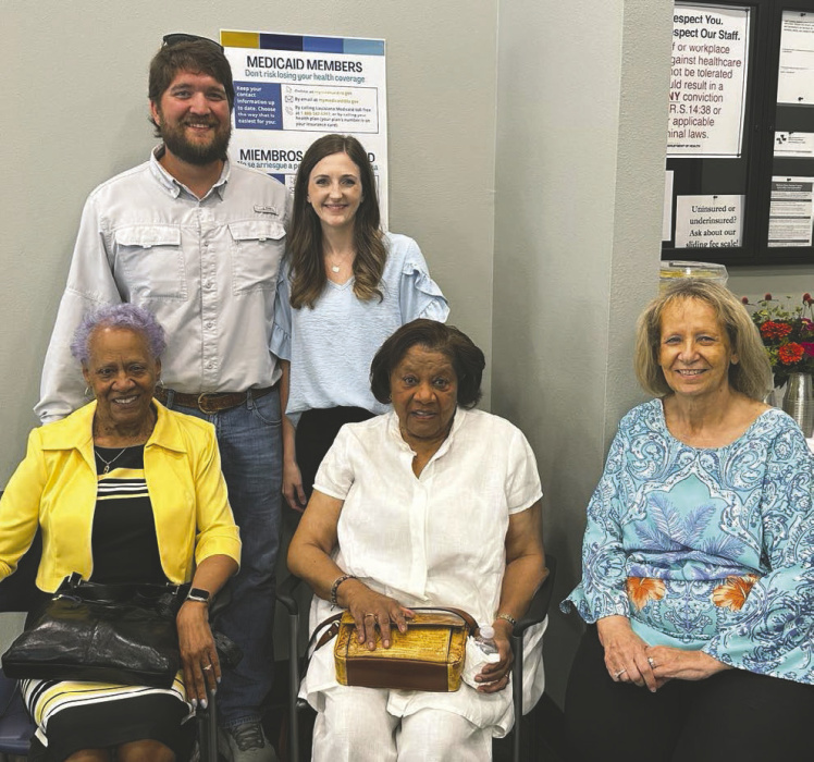 Hospital board fetes new doctor in town