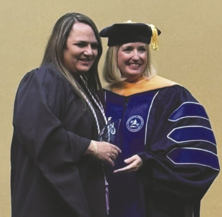 Tara Wallace (left) with professor
