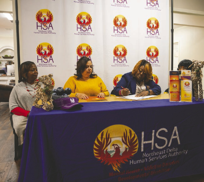 Some members of the East Carroll Parish School Board signed an MOU with the Northeast Louisiana Human Services Authority to provide health services in the district's schools. Pictured (from left are Jackie Folks, board vice president, a representative of NEDHSA, Meagan Brown, superintendent, and Wanda Jackson, board president. COURTESY PHOTO