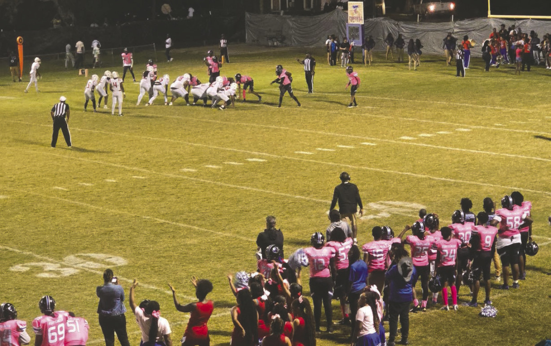 General Trass Panthers during a play against Bastrop on October 3. The Panthers donned pink jerseys in honor of Breast Cancer Awareness Month in October. GLENN DIXON