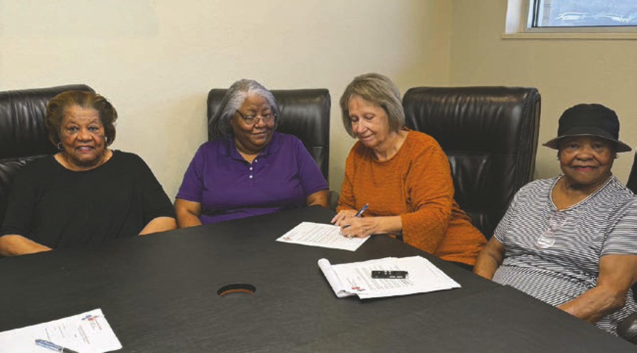 DEBRA HOPKINS Board members at contract signing (from left) Vera Porter, Barbara McDaniel, LaDonna Englerth, administrator, and Dorothy Lewis.
