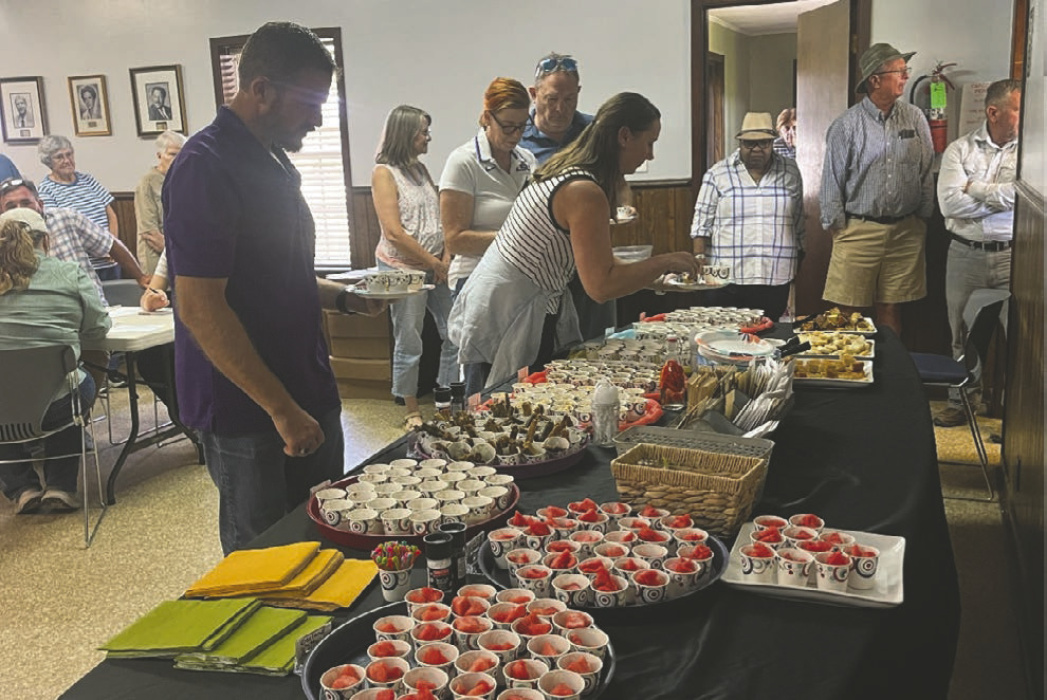 COURTESY PHOTO Attendees participating in the Taste Testing session with samples of LSU heirloom watermelon, peas, okra, tomato and eggplant.