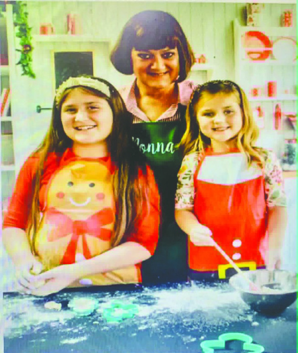 Laura with her granddaughters