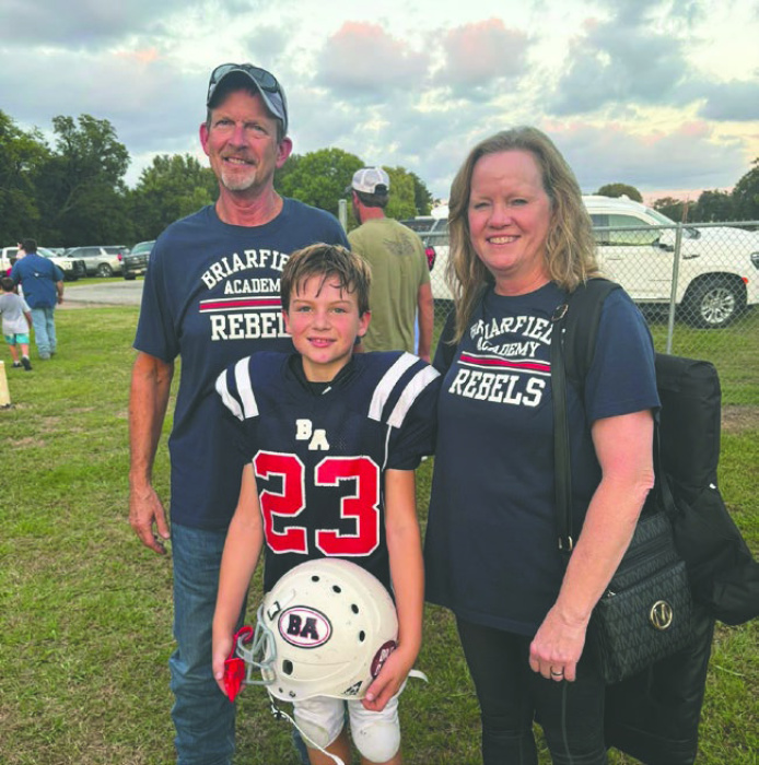 Tim and Ellie Huskey with Kason Van Mol